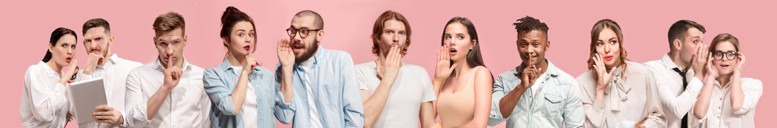 Young men and women whispering a secret on pink background
