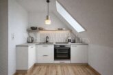 1-Zimmer-Dachgeschoss-Appartement mit Galerie in Weisenheim am Sand – zur Miete - Küchennische (Digitale Visualisierung)