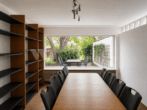 Architektonisch markantes Mehrfamilienhaus der klassischen Moderne - EG-Wohnzimmer