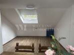 Architektonisch markantes Mehrfamilienhaus der klassischen Moderne - DG-Zimmer 3 mit Kochbereich