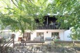 Architektonisch markantes Mehrfamilienhaus der klassischen Moderne - Gartenansicht