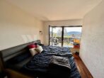 Großzügiges MFH mit 350 m² Wohnfläche und beeindruckendem Panoramablick in Eisenberg - Pfalz 6% BMR - EG - Schlafzimmer