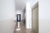 Zeitgemäße 3,5-Zimmer-Erdgeschosswohnung mit Terrasse in Ludwigshafen Mitte - Treppenhaus