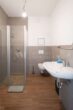 Zeitgemäße 3,5-Zimmer-Erdgeschosswohnung mit Terrasse in Ludwigshafen Mitte - Badezimmer