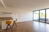 Zeitlose Bauhaus-Architektur – stilvoll wohnen in Mannheim-Casterfeld - Wohnenbereich mit offener Küche